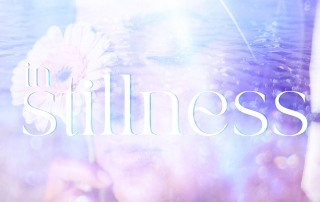 In Stillness - Wisdom Note - 04.08.23 (woman in stillness with flower to her face)